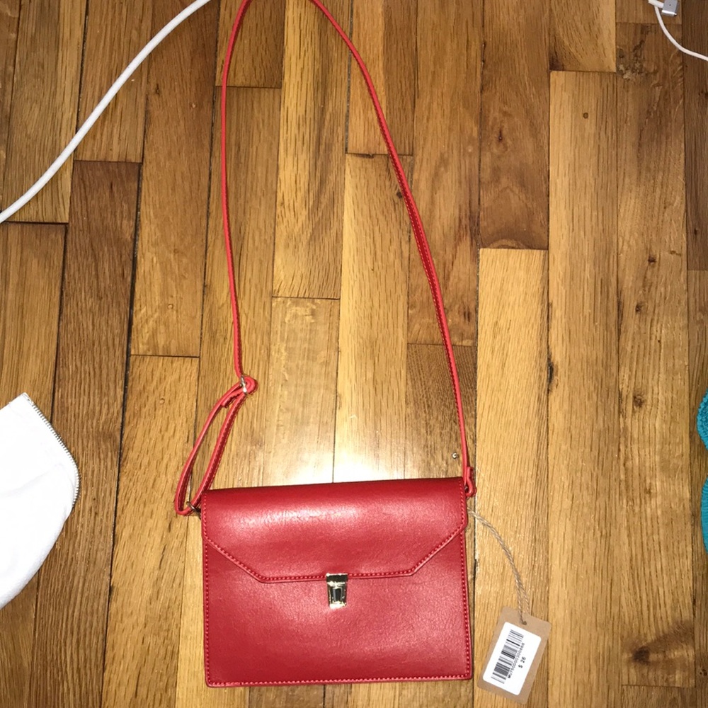 Red clutch crossbody bag